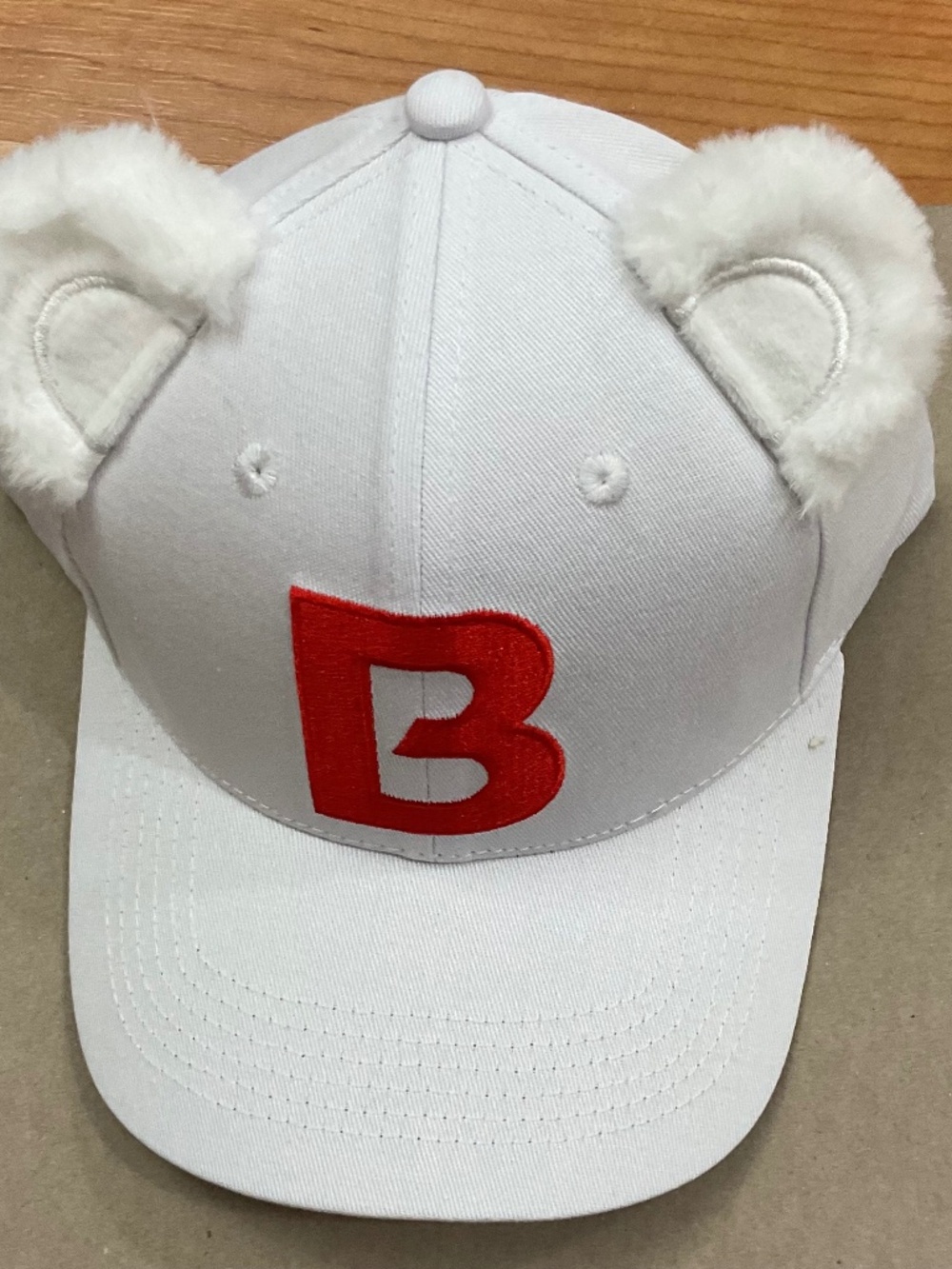 Bimbo branded white cap with bear ears